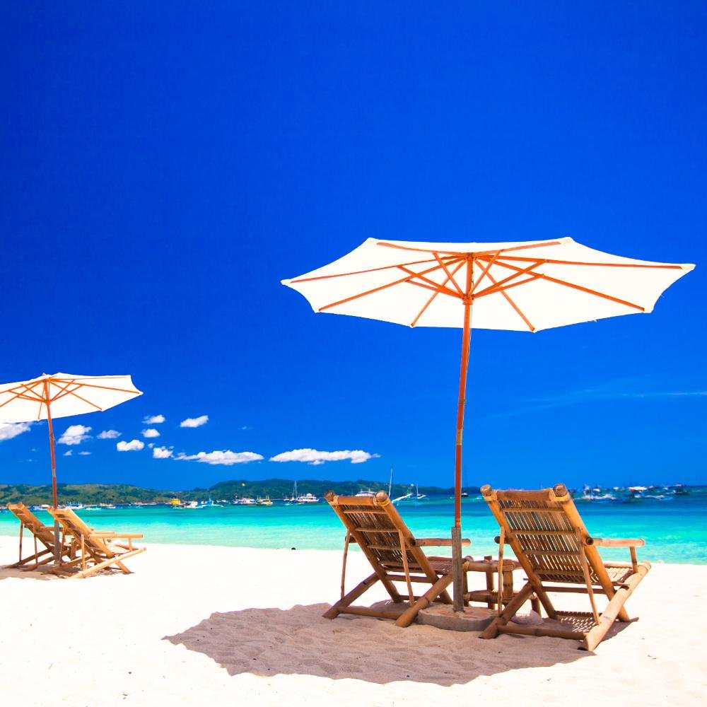 wooden chairs and umbrellas on white sand beach fa 2023 11 27 04 56 46 utc.jpg